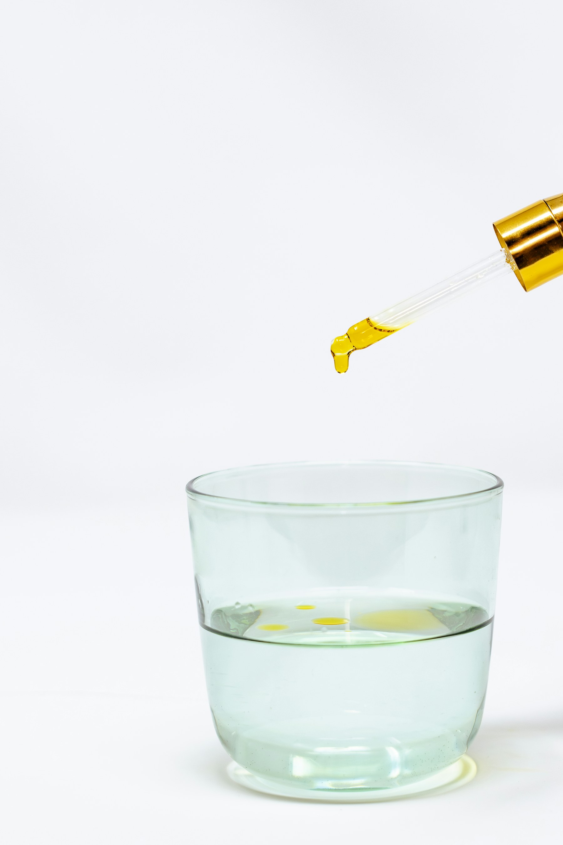 Supplement liquid added to a glass of water